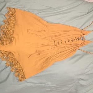 Mustard romper with lace detailing